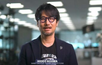 Hideo Kojiman mielestä Sony on tekemässä hirveän virheen poistamalla fyysiset pelit Peliohjaaja Hideo Kojima seisoo toimistoympäristössä.