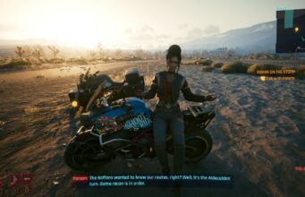 CD Projekt Redin siirtyminen omasta pelimoottorista UE5:een ei ollut Cyberpunk 2077:n ongelmien syytä Nainen nojaa moottoripyöräänsä aavikolla.