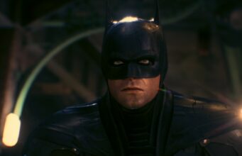 Robert Pattinson vihjaa suuresta muutoksesta The Batmanin jatko-osassa Batman tuijottaa synkästi kameran ohi.