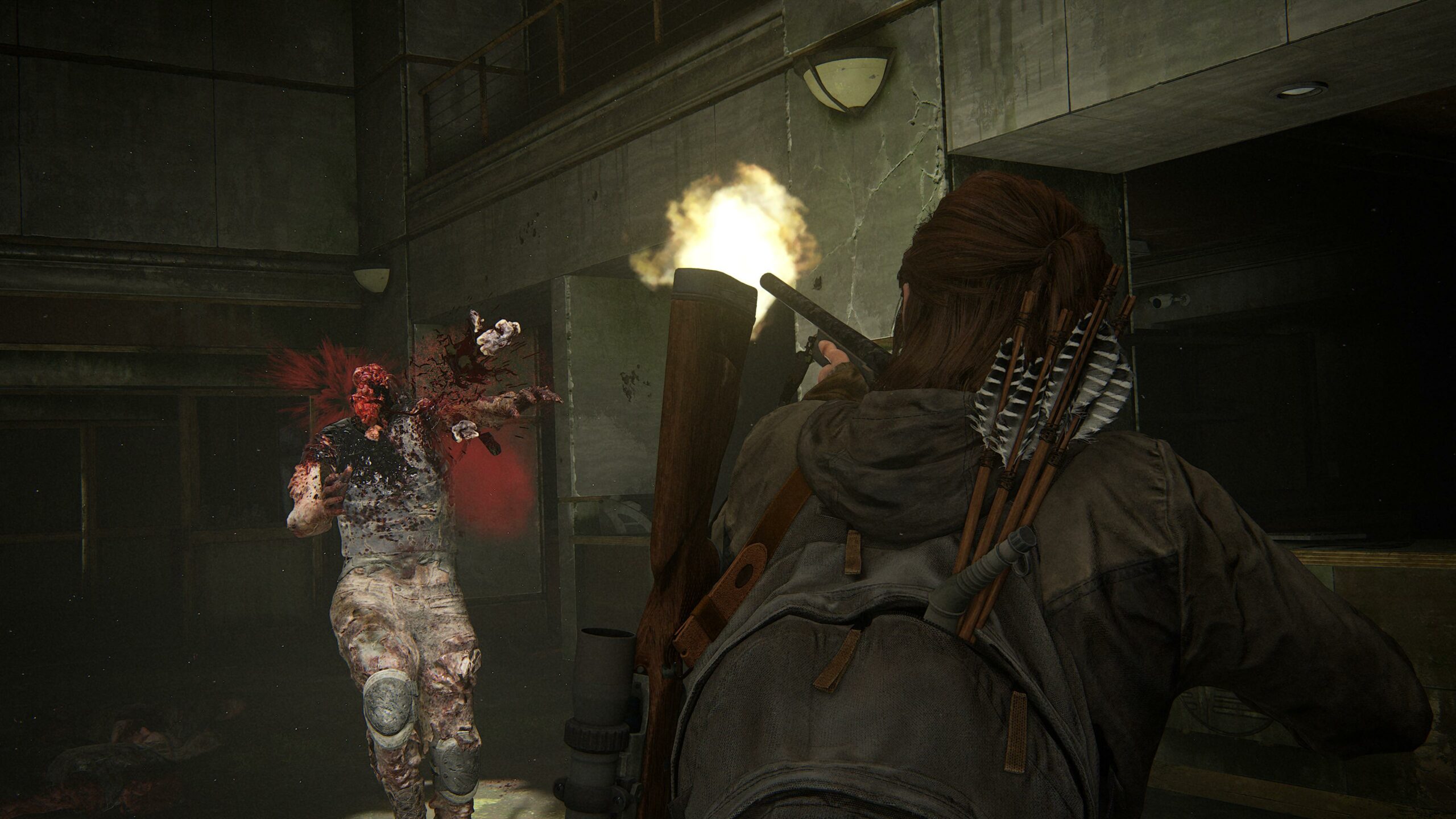 Ellie ampuu zombia päähän.