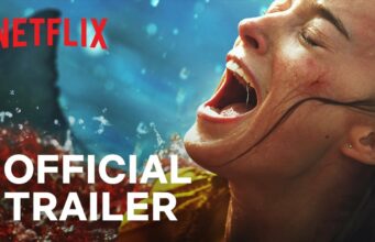 Hurrikaani tuo hait pikkukaupunkiin Netflixin uudessa Thrash-selviytymiskauhuelokuvassa Dramaattinen videon pikkukuva, jossa nainen huutaa suu ammollaan ja silmät puristettuina kiinni. Hän on vedessä, ja hänen takanaan näkyy hain evä sekä roiskuvaa verta muistuttavaa punaista nestettä. Kuvan vasemmassa yläkulmassa on punainen Netflix-logo ja alareunassa lukee suurilla valkoisilla kirjaimilla "OFFICIAL TRAILER". Valaistus on kirkas ja tunnelma erittäin intensiivinen.