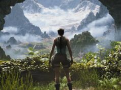Tomb Raider -studio irtisanoo taas lisää työntekijöitä Lara Croft seisoo selin suuren luolan suuaukolla, jota reunustavat vihreät kasvit. Hän katsoo ulos massiiviseen, sumuiseen vuoristomaisemaan, jonka huiput ovat lumen peitossa. Hahmolla on yllään klassinen turkoosi toppi, shortsit ja reisi-kotelot aseille.