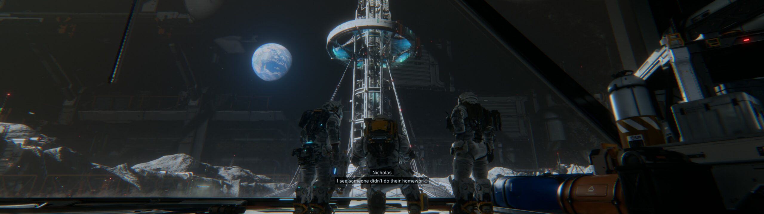 kolme avaruuspukuista miestä katselee kuussa valtaisaa tulostinta. Nicholas: "I see someone didn't do their homework"