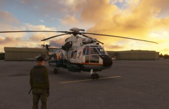 Microsoft Flight Simulator 2024 saa seuraavassa päivityksessä PSVR 2 -tuen Pelinäkymä Microsoft Flight Simulator -pelistä, jossa lentäjä seisoo selin katsojaan lentokentän asfaltilla katsoen Rajavartiolaitoksen Super Puma -helikopteria. Helikopteri on väritykseltään valkoinen ja tummanvihreä oransseilla yksityiskohdilla, ja siinä on rekisteritunnus OH-HVQ. Taustalla näkyy matalia lentokenttärakennuksia ja upea ilta-aurinko, joka värjää pilvet kullankeltaisiksi ja oransseiksi.