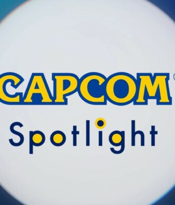 Capcom esittelee tulevia pelejään tällä viikolla Grafiikka, jossa lukee keskellä kelta-sinisin kirjaimin "CAPCOM Spotlight" valkoisessa ympyrässä, jota ympäröivät siniset, abstraktit muodot ja valonheittimet.