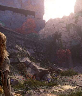 Seuraavaa God of War -peliä ei tähditä enää Kratos – pelistä julkaistiin 20-minuuttinen esittelyvideo Pelinäkymä kolmannen persoonan toimintaseikkailupelistä, jossa pitkähiuksinen naishahmo on kuvattu takaapäin selin kameraan. Hahmo katsoo kohti muinaisia, raunioituneita rakenteita ja vehreää kalliomaisemaa, jossa kasvaa köynnöksiä sekä punaisia ja valkoisia kukkia. Vasemmalla ylhäällä kohoaa valtava, sinertävä ja kuvioitu kiviseinä tai monumentti, ja oikealla puolella kalliossa näkyy holvimainen oviaukko. Aurinko paistaa kirkkaasti kukkuloiden takaa luoden vastavalofon. Ruudun vasemmassa alakulmassa näkyy pelin tyylitelty logo "GOD OF WAR LAUFEY" ja oikeassa alakulmassa teksti "Captured On PS5® Pro".
