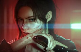 Capcomin mukaan Resident Evil Veronica on yhtä merkittävä remake, kuin pelisarjan aiemmat osat Lähikuva päättäväisestä ja vertavuotavasta naishahmosta, joka pitelee käsiasetta valmiusasennossa kasvojensa edessä punaisen taustavalon ja sinivihreän valonheijastuksen (lens flare) keskellä.