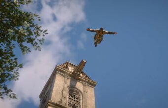 Miten menee Assassin’s Creed -aikajana? Näin koko pelisarjan tarina etenee antiikin Kreikasta teollistuvaan Lontooseen Hahmo hyppää tornin huipulta ilman halki "uskon hyppy" -tyyliin sinistä taivasta vasten.