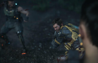 Wolverine oli todellinen syksyn pelihitti Yhdysvalloissa Pelin valokuvatilan otos taistelutilanteesta, jossa haavoittunut Wolverine kyykkii valmiudessa kynnet esillä hämärässä maastossa vastustajan edessä.