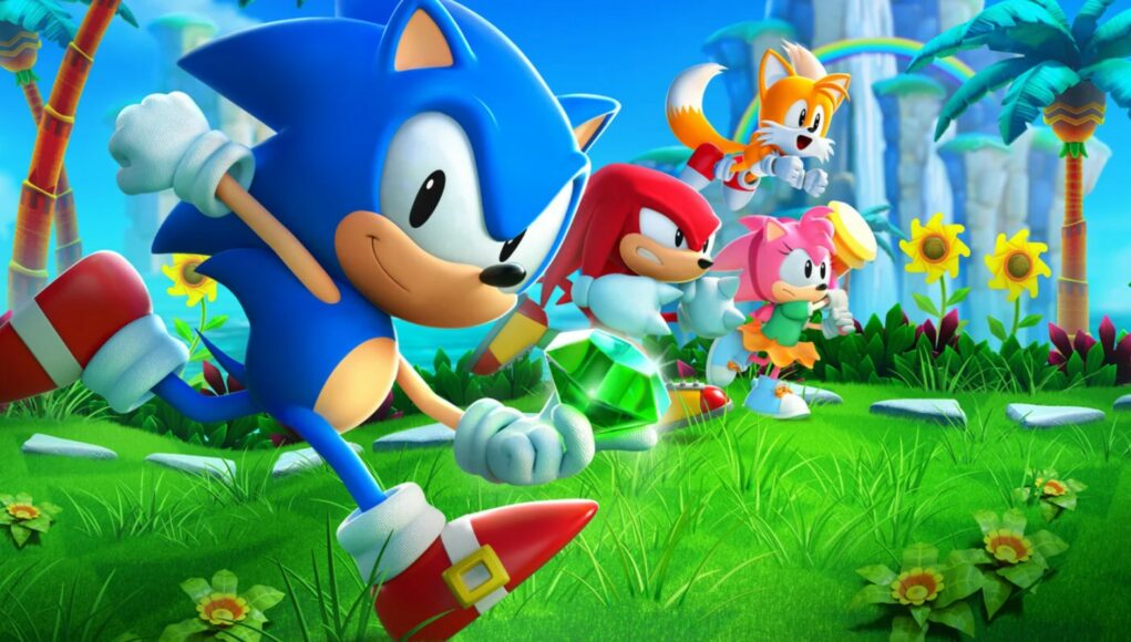 sonic Värikäs pelikuvitus, jossa Sonic pitää kädessään vihreää kaaosemeraldia ja juoksee eteenpäin vehreällä nurmialueella yhdessä Tailsin, Knucklesin ja Amyn kanssa trooppisessa maisemassa.